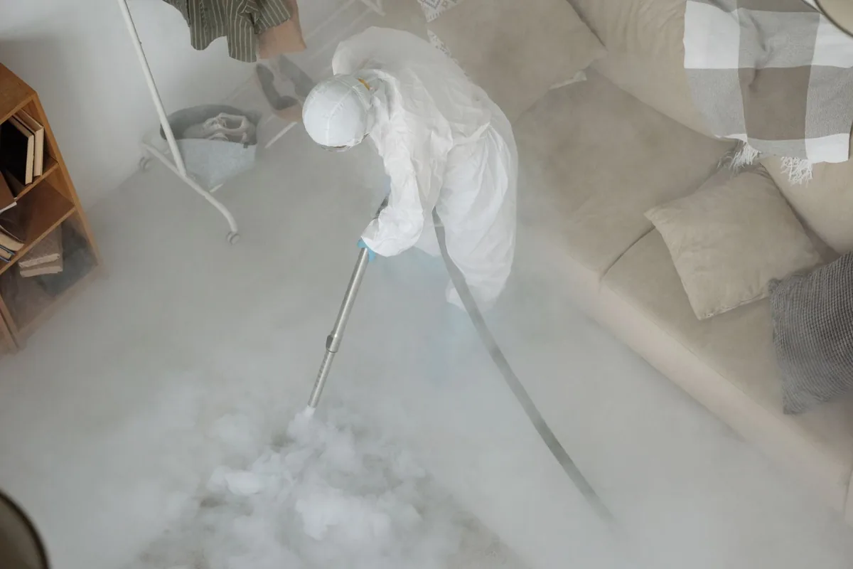 Biohazard cleanup technician in protective equipment, Berkeley Park, Atlanta, GA